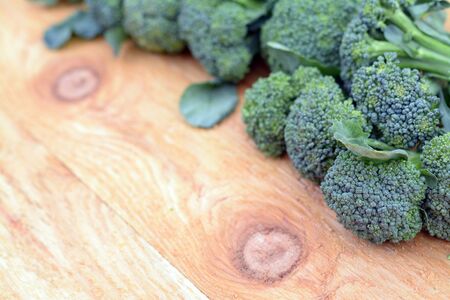 green organic broccoli formed for frame (focus on closest broccoli) の写真素材