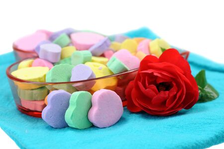 heart shape candies and red rose for holiday の写真素材