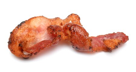 single fried Bacon strip on white  backgroundの写真素材