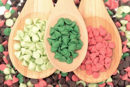 top view nipple chips on wooden spoonsの写真素材