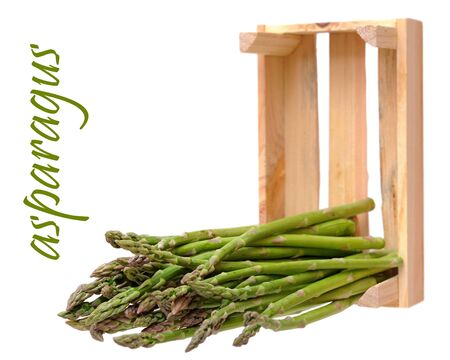 fresh asparagus falling out crate isolated on white backgroundの写真素材