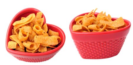 two view of heart shape bowl of corn chip isolated on white