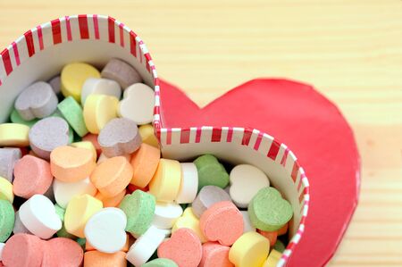 colordul candies in heart shape box for valentine decorationの写真素材