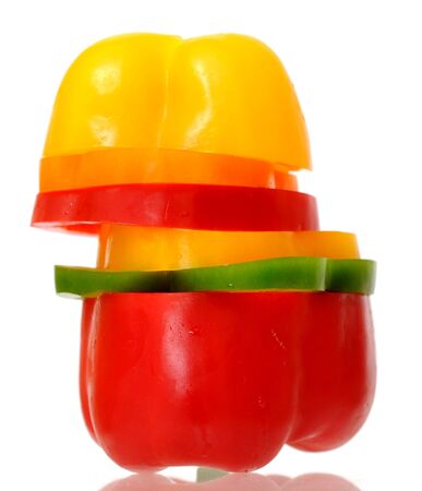 slices of colorful bell pepper isolated on white background の写真素材