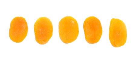 five dried apricot on white backgroundの写真素材