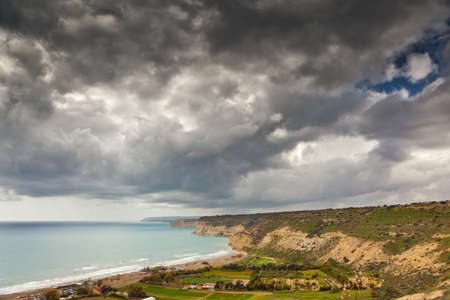 Dark sky over coastline at Cyprusの写真素材