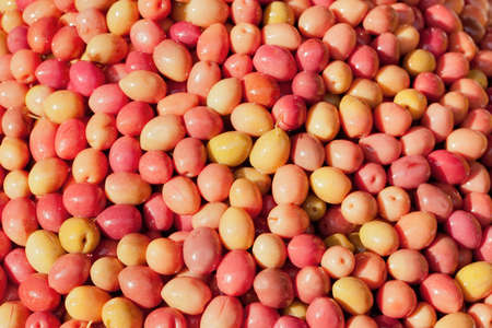 Olives under bright sun at the Marrakkesh marketの写真素材