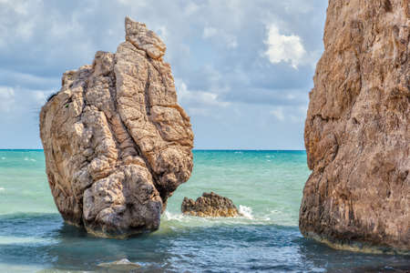 Rock at empty pebble beach Petra tou Romiou at early spring, Cyprusの写真素材