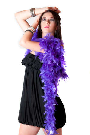 Beautiful sexy brunette model with blue eyes in sexypurple scarf in black mini dress standingの写真素材