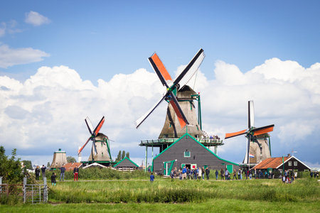 ZAANSE SCHANS, NETHRLANDS - AUGUST 24, 2014: Nature and windmills in Zaanse Schans, Northe Holland, Netherlands. Popular tourist destination in Netherlandsのeditorial素材