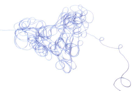 Heart shaped entangled blue threads isolated on whiteの写真素材