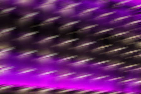 Absract background with motion blurred purple lights and copy space for your text