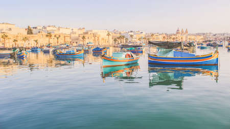 Luzzu, traditional maltese eyed boats, Marsaxlokk bay, Maltaの写真素材