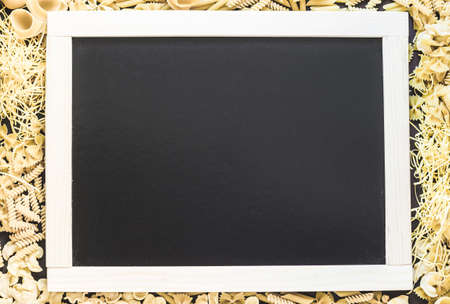 Mixed dried pasta selection with space for your text. Top view shotの写真素材