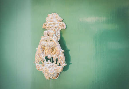Old Metal Knocker on Green Door in Mdina, Malta. Space for your textの写真素材