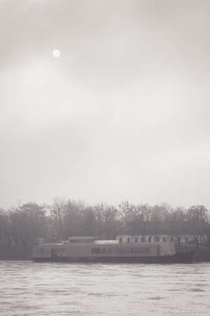 Black and White Landscape with Excursion boat on Danube river in Bratislava, Slovak Republic....