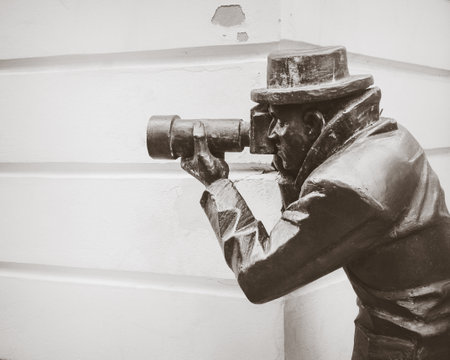 BRATISLAVA, SLOVAKIA - DECEMBER 2012. The bronze statue of Paparazzi in Bratislava is one of the main contemporary attractions in Bratislava on December 31, 2012. Black and white photoのeditorial素材