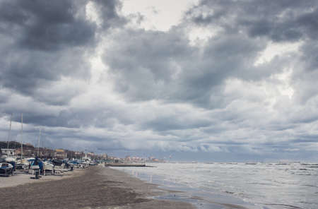 Beautiful landscape of the coast with dramatic sky and uncalm sea. Falconara, Italy.の写真素材