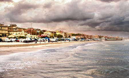 Beautiful landscape of the coast with dramatic sky and choppy sea. Falconara, Italy.の写真素材
