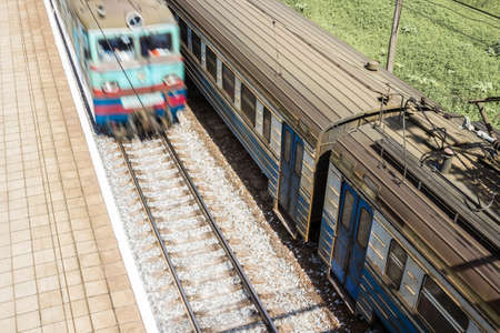 Train is arriving at the platform. Motion blur. View from aboveの写真素材