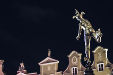 GDANSK, POLAND - JANUARY 1, 2015: Statue of Hermes in Old Town of Gdansk by night, Polandのeditorial素材
