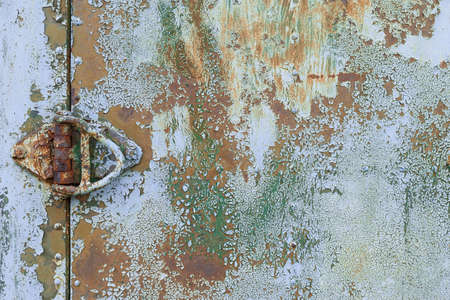 Old blue painted wall with rust texture. Grunge rusted metal background. Rust stains.の写真素材