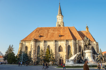 CLUJ-NAPOCA, ROMANIA - October 19, 2014: Unirii Square and The St. Michael's Church in Cluj-Napoca, Romaniaのeditorial素材