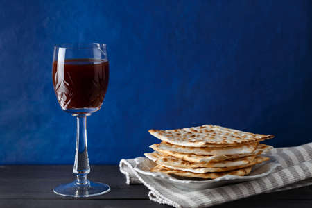A Jewish Matzah bread with wine. Passover holiday conceptの写真素材