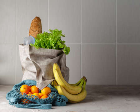 Textile shopping eco bag full of groceries. Zero Waste shopping conceptの写真素材