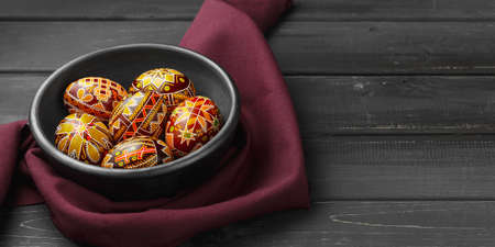 Ukrainian Easter eggs decorated with wax-resist dyeing technique, traditional for Eastern European...