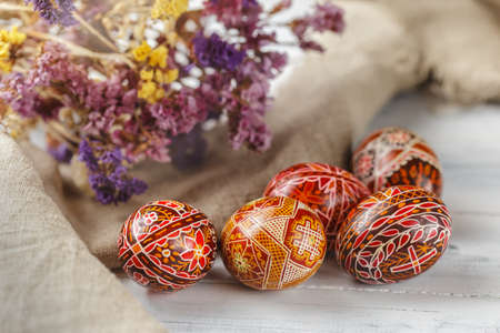Pysanky, Ukrainian Easter eggs decorated with wax-resist dyeing technique, traditional for Eastern...