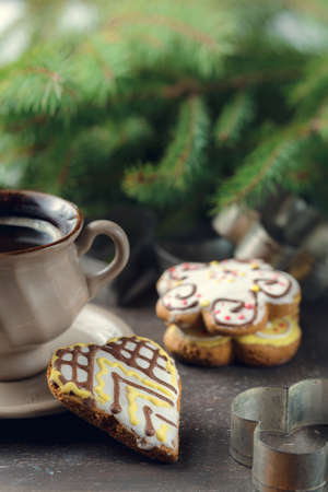 Cup of black coffee with christmas tree and gingerbread cookies, top viewの写真素材