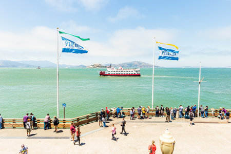 SAN FRANCISCO, CALIFORNIA, USA - July 24, 2018: Tourists enjoying view of Alcatraz Island from Pier 39 in Fishermans Wharf - San Francisco, California, USAのeditorial素材