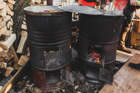 LVIV, UKRAINE - March 23, 2022: Military kitchen boiler at Lviv Central Railway Station where volunteers provide free food for the refugees escaping from the russian war against Ukraine.のeditorial素材