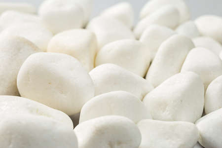 White rock on the grey background. Decorative stone natural materialの写真素材