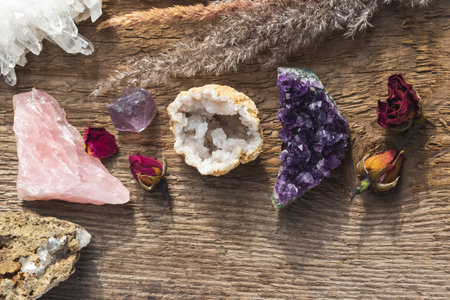 Stones and Minerals Arrangement for Magic Crystal Healing Spiritual Practice or Reiki Therapy. Top View on Wooden Table.の写真素材