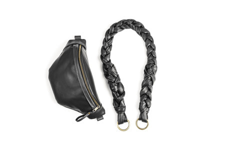 Black Leather Unisex Fanny Pack or Waist Pack Hand Bag with Detached Braided Strap Isolated on White Backgroundの写真素材