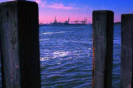 Piling. Ocean. Sky.の写真素材