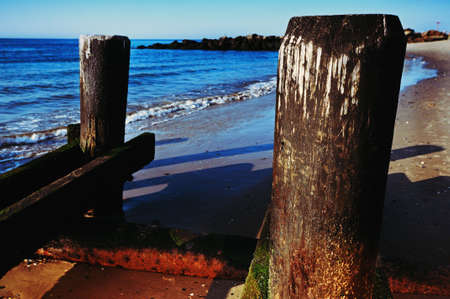 Piling. Ocean. Sky.の写真素材