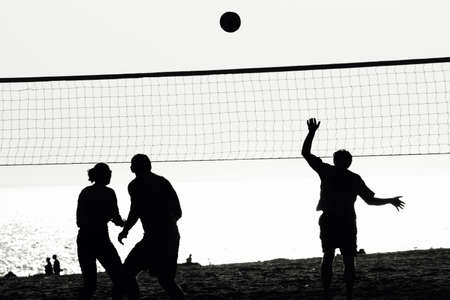 Volleyball. Men. Woman. Beach.の写真素材