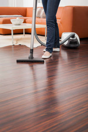 Closeup of Vacuum Cleaner in Living Roomの写真素材