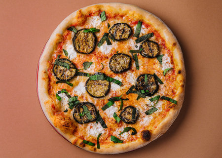 Vegetarian pizza with roasted vegetablesの写真素材