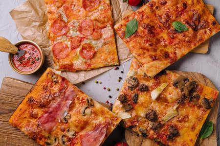 Tasty pizza on the wooden backgroundの写真素材