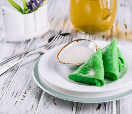 Green pancakes from spinach top viewの写真素材