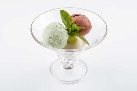 Three balls of ice cream in a transparent glassの写真素材
