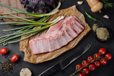 Fresh raw pork ribs with ingredientsの写真素材