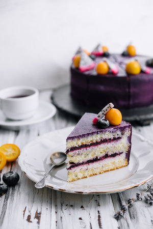 Classic blueberry cheesecake on the kitchen tableの写真素材