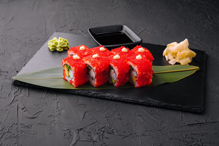 Sushi, rolls, California uramaki with tobiko caviarの写真素材