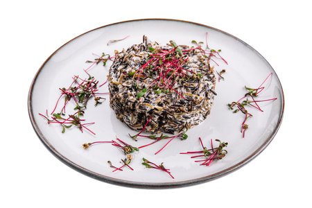 Delicious cooked black rice or risotto on plateの写真素材