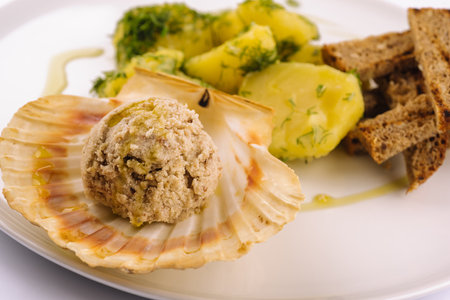 Baked scallop. A delicious meal from Galicia, Spain.の写真素材